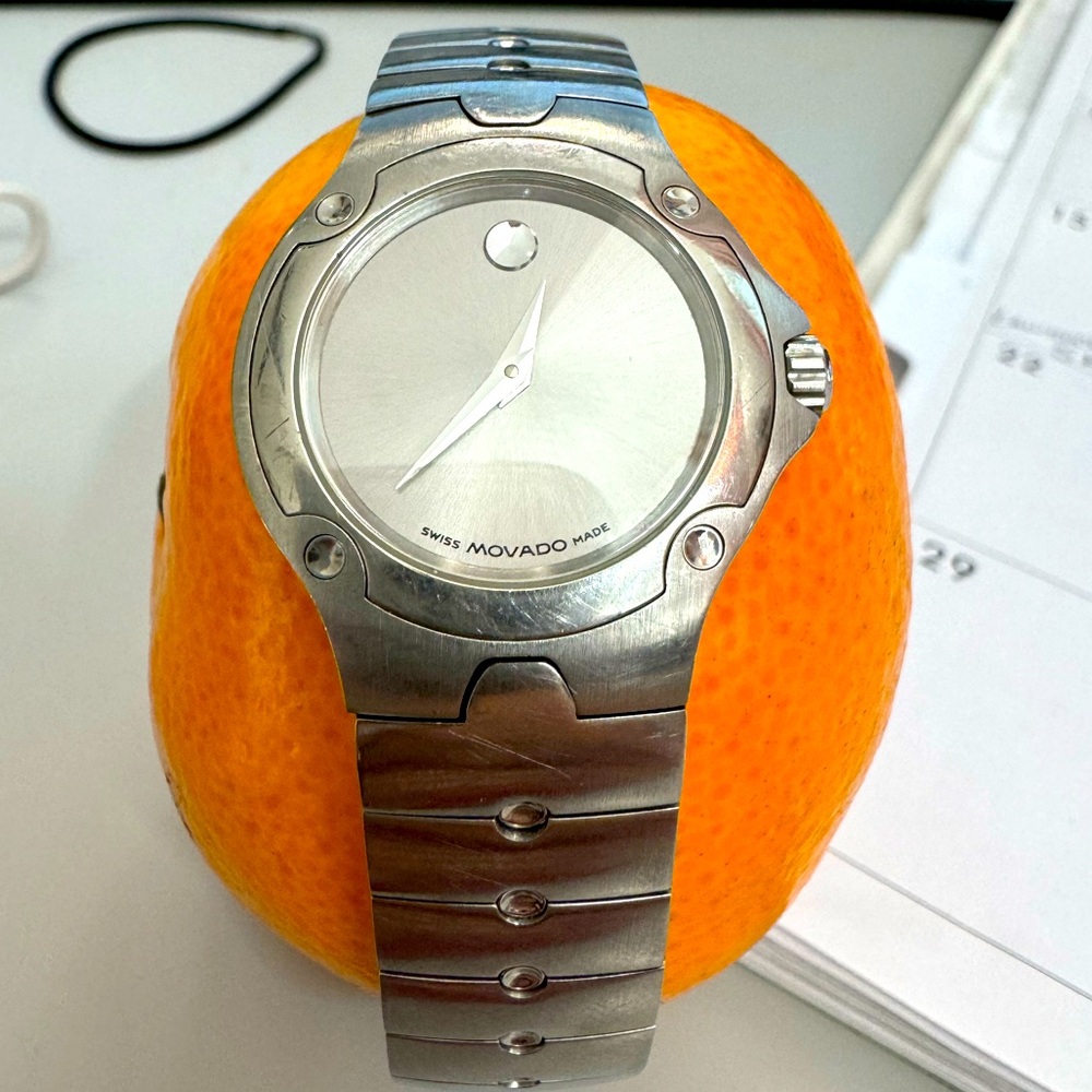 Women’s Movado stainless steel watch.